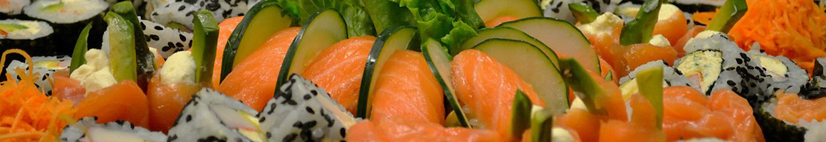 Eating Japanese Thai Sushi at Asuka Sushi restaurant in New York, NY.